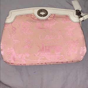 light pink clutch coach